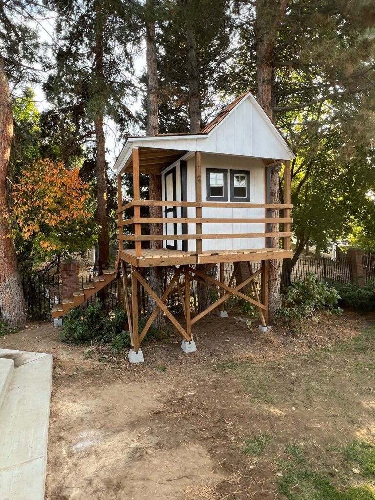 Custom-built outdoor storage shed by shed builder in Orem, UT with weather-resistant siding