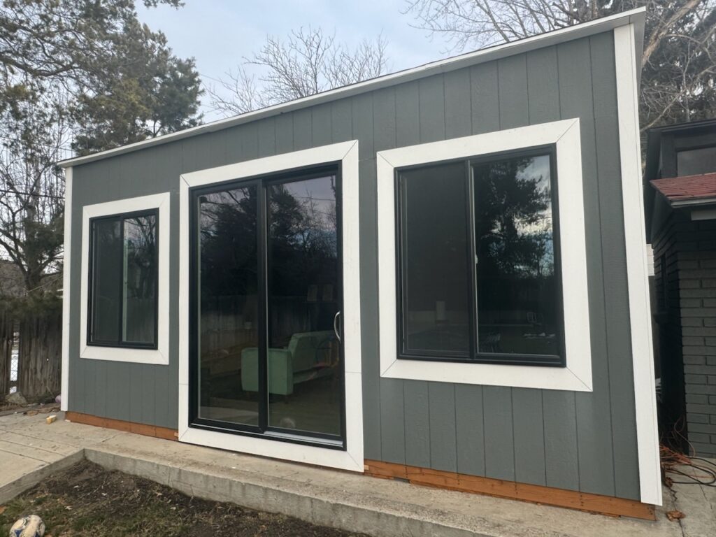Modern backyard studio built by shed builder in Riverton, UT, in new suburban home