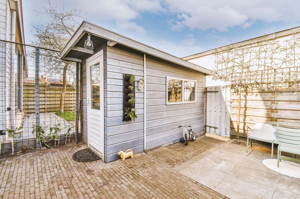 Weatherproof storage shed by shed builder in Sandy, UT installed in East Bench neighborhood