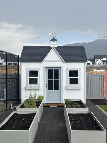 Custom shed services in Lehi, UT by Solitude Custom Sheds installation team