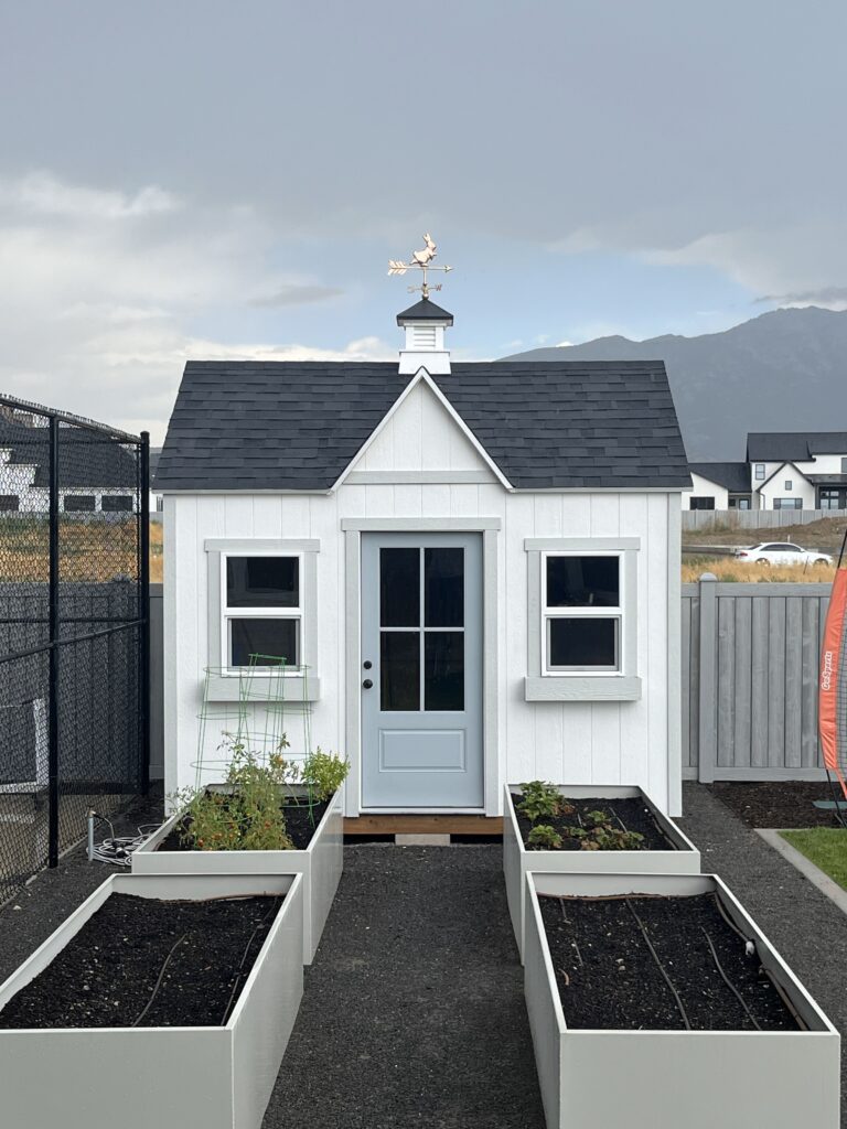Custom shed services in Lehi, UT by Solitude Custom Sheds installation team