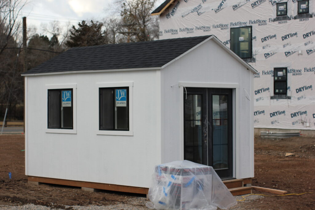 Custom-built she shed in Provo, UT with cozy backyard setting