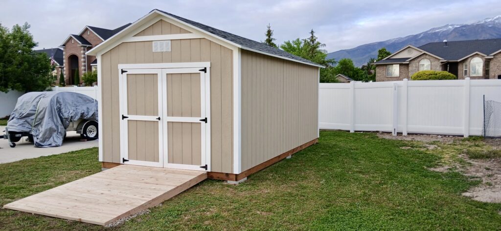 Custom garden shed by shed builder in Layton, UT installed in a residential backyard